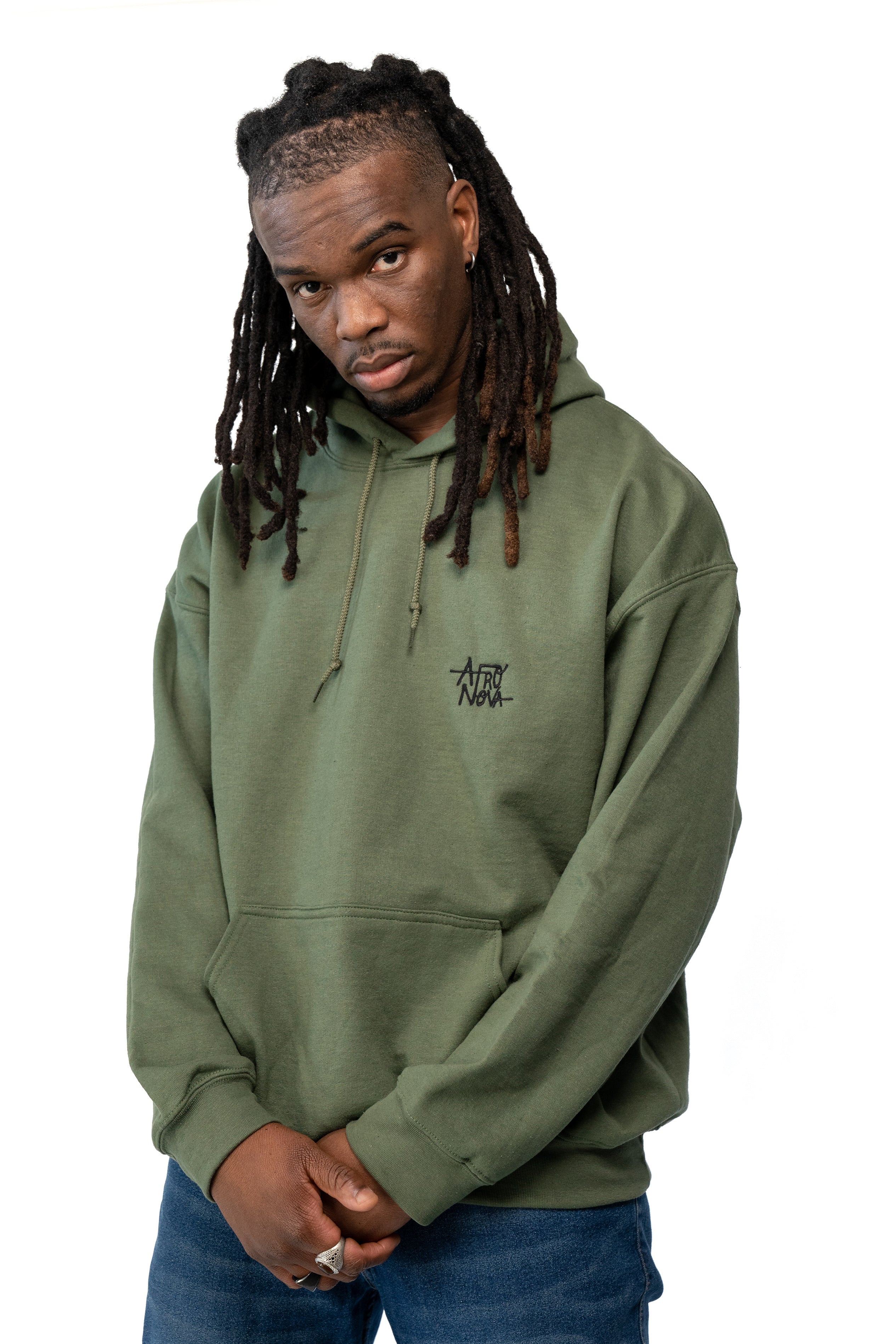 Man with dreadlocks wearing an olive or military green hoodie