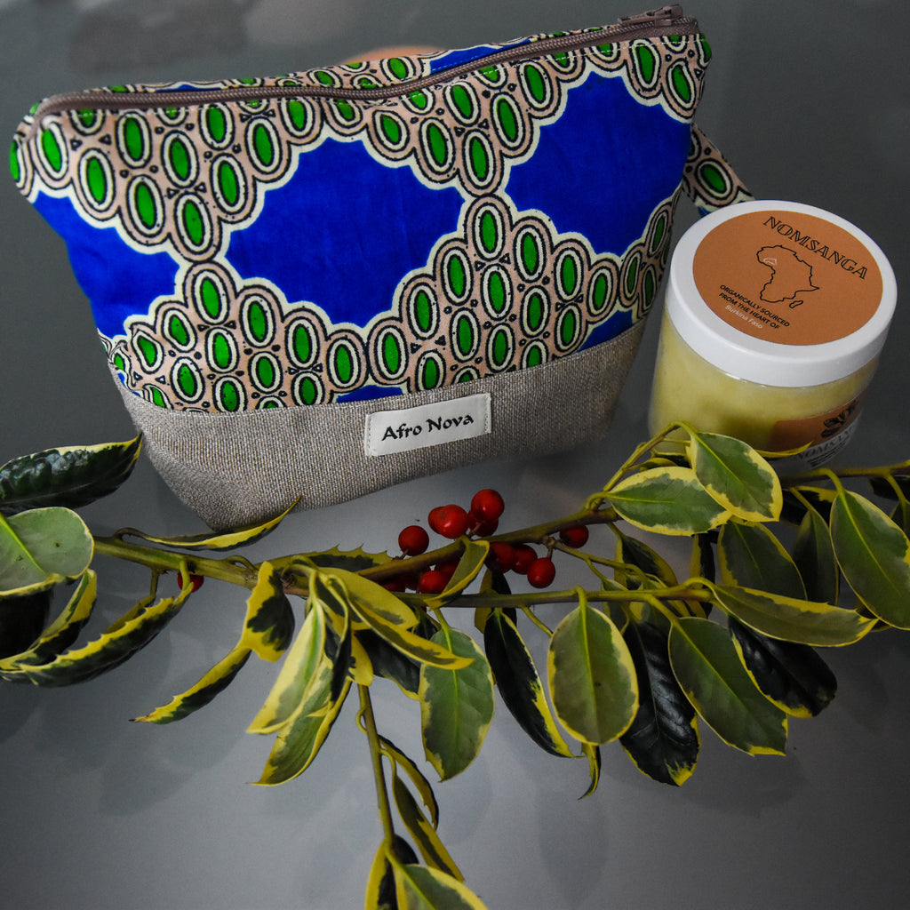 this blue and green pouch handmade of African print fabrics with scales pattern with unrefined shea butter